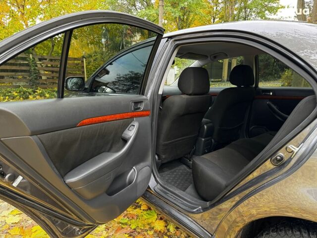 Серый Тойота Авенсис, объемом двигателя 2 л и пробегом 127 тыс. км за 7490 $, фото 19 на Automoto.ua