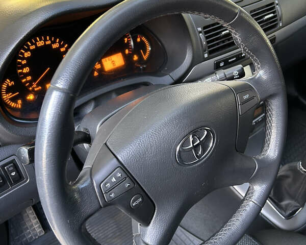 Серый Тойота Авенсис, объемом двигателя 2 л и пробегом 153 тыс. км за 8499 $, фото 20 на Automoto.ua