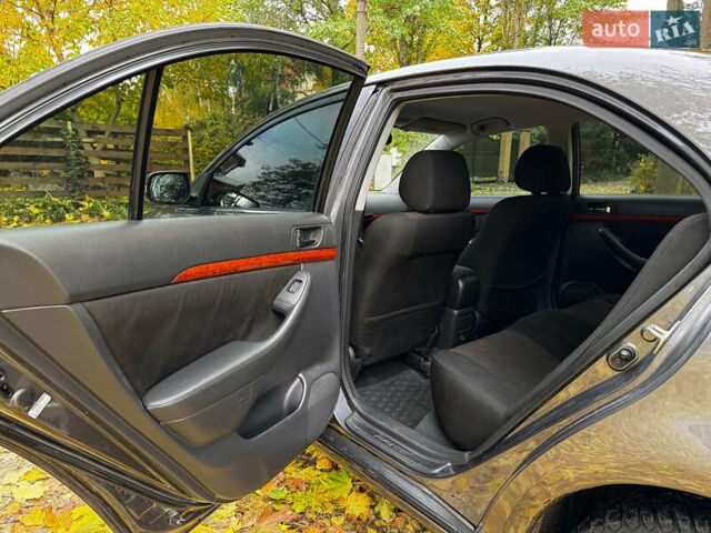 Серый Тойота Авенсис, объемом двигателя 2 л и пробегом 127 тыс. км за 7490 $, фото 20 на Automoto.ua