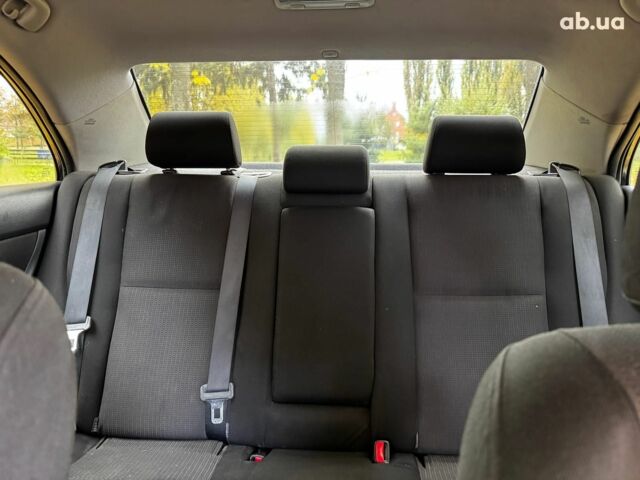 Серый Тойота Авенсис, объемом двигателя 2 л и пробегом 127 тыс. км за 7490 $, фото 15 на Automoto.ua