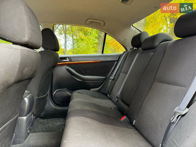 Серый Тойота Авенсис, объемом двигателя 2 л и пробегом 127 тыс. км за 7490 $, фото 18 на Automoto.ua