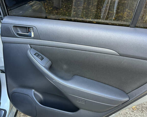 Серый Тойота Авенсис, объемом двигателя 2 л и пробегом 153 тыс. км за 8499 $, фото 10 на Automoto.ua