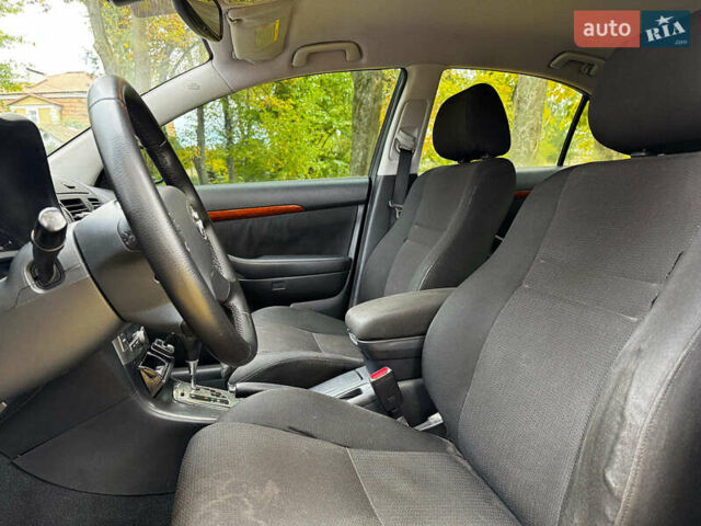 Серый Тойота Авенсис, объемом двигателя 2 л и пробегом 127 тыс. км за 7490 $, фото 14 на Automoto.ua