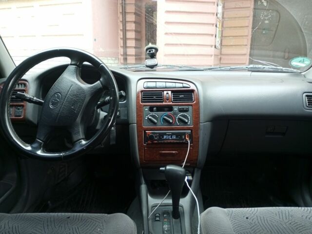 Серый Тойота Авенсис, объемом двигателя 1.8 л и пробегом 534 тыс. км за 3000 $, фото 5 на Automoto.ua