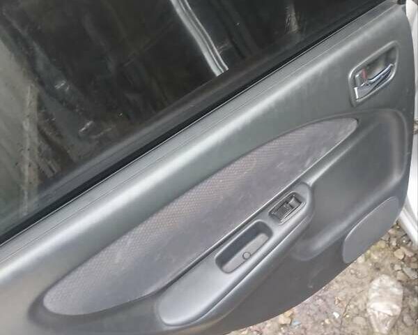 Серый Тойота Авенсис, объемом двигателя 1.8 л и пробегом 427 тыс. км за 4250 $, фото 11 на Automoto.ua