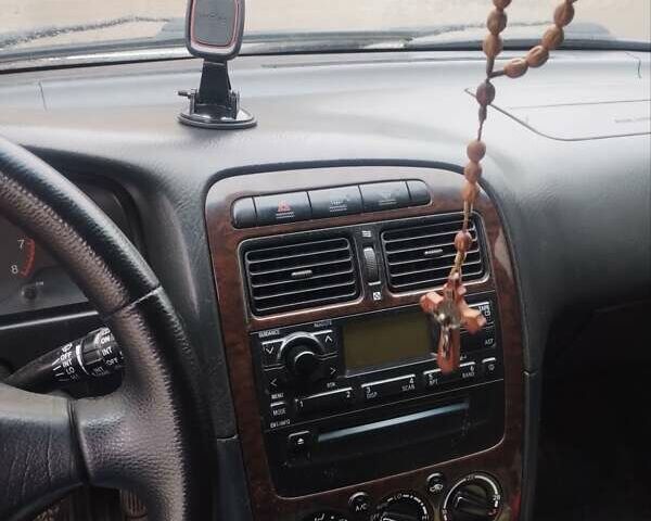 Серый Тойота Авенсис, объемом двигателя 1.8 л и пробегом 427 тыс. км за 4250 $, фото 6 на Automoto.ua