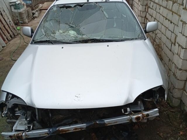 Серый Тойота Авенсис, объемом двигателя 2 л и пробегом 200 тыс. км за 1000 $, фото 2 на Automoto.ua