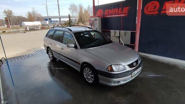 Серый Тойота Авенсис, объемом двигателя 1.79 л и пробегом 360 тыс. км за 3900 $, фото 2 на Automoto.ua