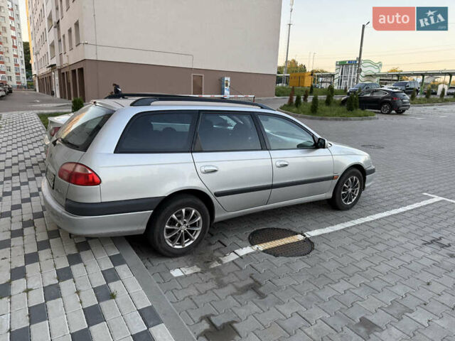 Серый Тойота Авенсис, объемом двигателя 1.8 л и пробегом 233 тыс. км за 4800 $, фото 2 на Automoto.ua