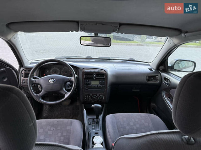 Серый Тойота Авенсис, объемом двигателя 1.8 л и пробегом 233 тыс. км за 4800 $, фото 5 на Automoto.ua