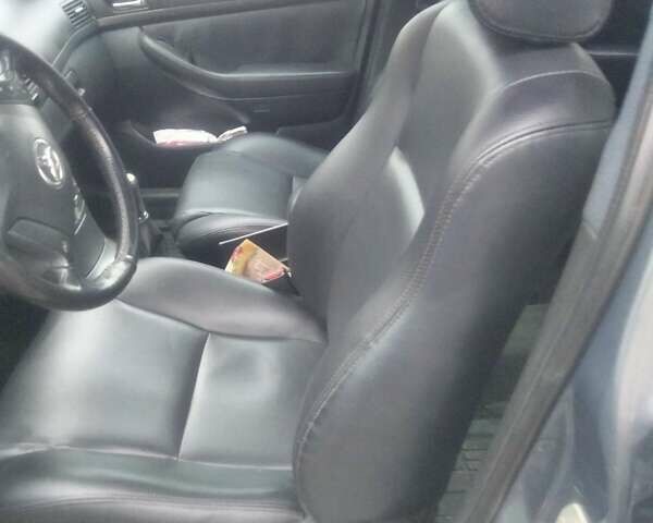 Серый Тойота Авенсис, объемом двигателя 2 л и пробегом 395 тыс. км за 5250 $, фото 5 на Automoto.ua