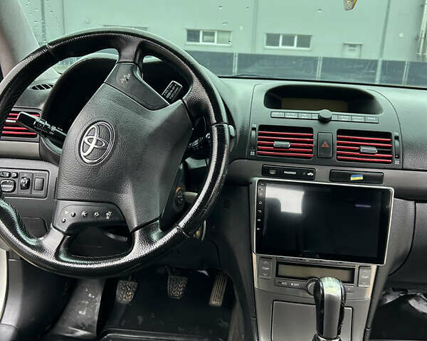 Сірий Тойота Авенсіс, об'ємом двигуна 2 л та пробігом 258 тис. км за 4950 $, фото 6 на Automoto.ua