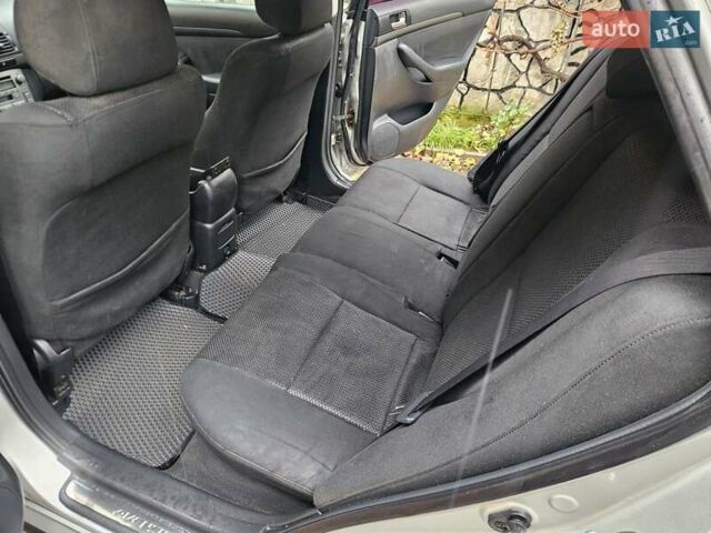 Серый Тойота Авенсис, объемом двигателя 2 л и пробегом 312 тыс. км за 4400 $, фото 24 на Automoto.ua