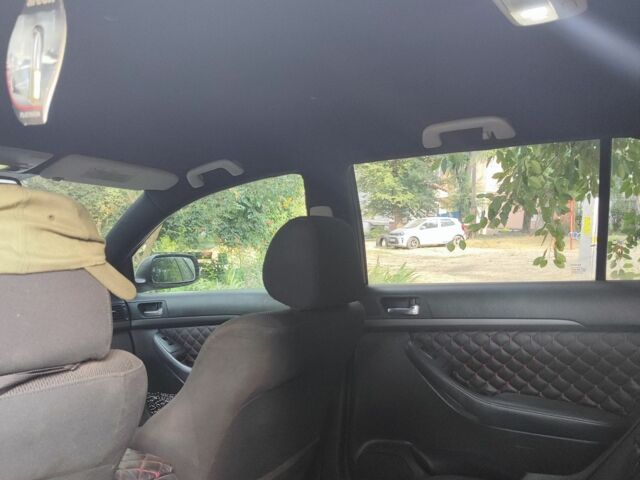 Серый Тойота Авенсис, объемом двигателя 2 л и пробегом 100 тыс. км за 3500 $, фото 6 на Automoto.ua