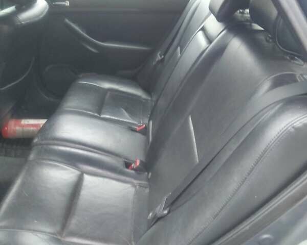 Серый Тойота Авенсис, объемом двигателя 2 л и пробегом 395 тыс. км за 5250 $, фото 6 на Automoto.ua