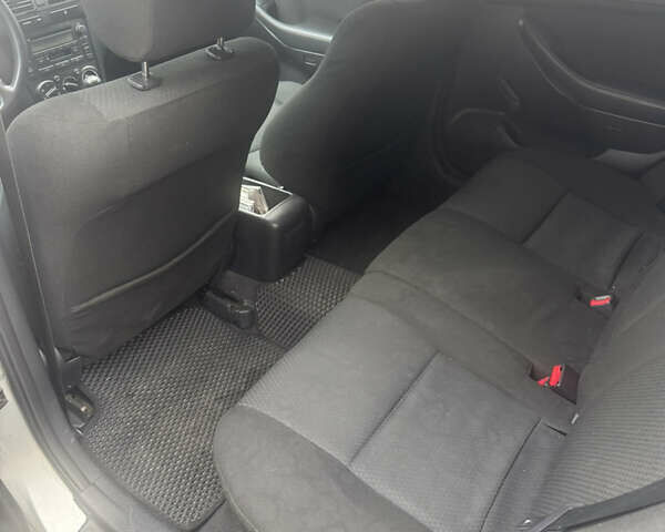 Серый Тойота Авенсис, объемом двигателя 2 л и пробегом 300 тыс. км за 6200 $, фото 6 на Automoto.ua