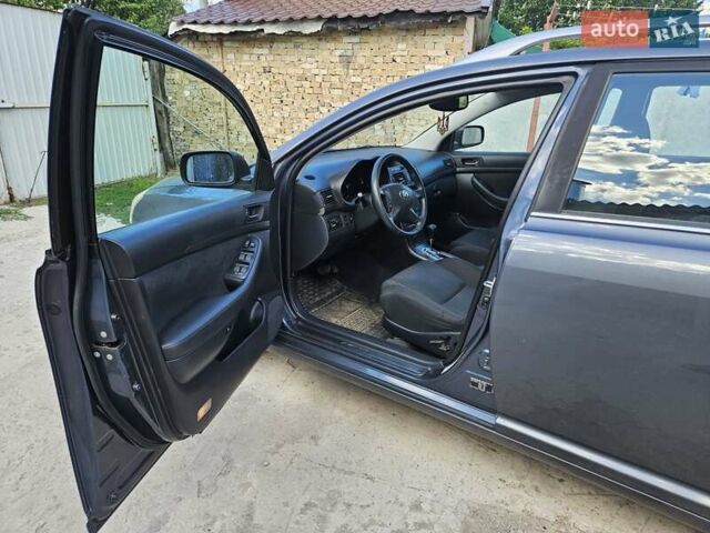 Серый Тойота Авенсис, объемом двигателя 1.79 л и пробегом 224 тыс. км за 7400 $, фото 7 на Automoto.ua