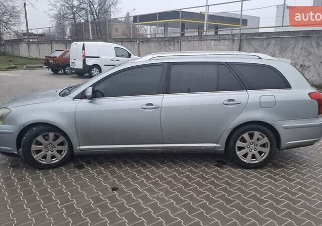 Серый Тойота Авенсис, объемом двигателя 2 л и пробегом 305 тыс. км за 6900 $, фото 1 на Automoto.ua