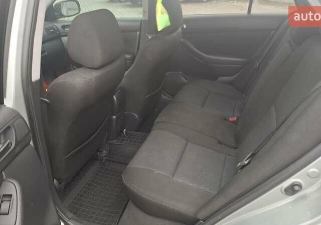 Серый Тойота Авенсис, объемом двигателя 2 л и пробегом 305 тыс. км за 6900 $, фото 6 на Automoto.ua