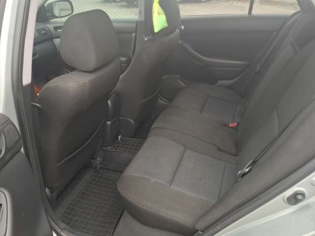 Серый Тойота Авенсис, объемом двигателя 2 л и пробегом 305 тыс. км за 6900 $, фото 7 на Automoto.ua