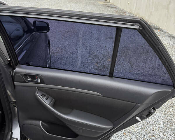 Серый Тойота Авенсис, объемом двигателя 2 л и пробегом 194 тыс. км за 7800 $, фото 79 на Automoto.ua