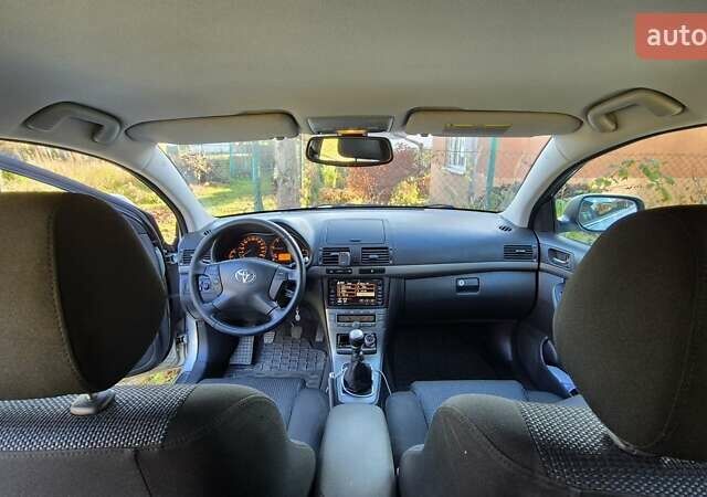 Серый Тойота Авенсис, объемом двигателя 2 л и пробегом 259 тыс. км за 7500 $, фото 12 на Automoto.ua