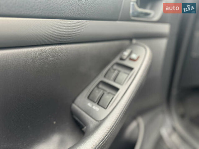 Серый Тойота Авенсис, объемом двигателя 2 л и пробегом 206 тыс. км за 7500 $, фото 16 на Automoto.ua