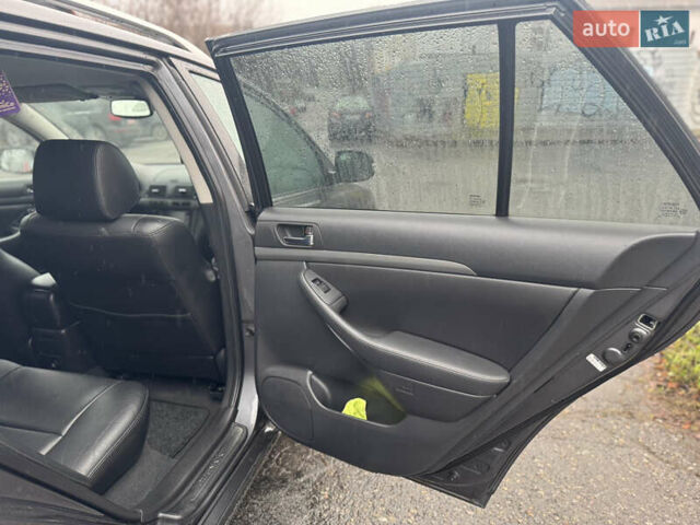 Серый Тойота Авенсис, объемом двигателя 2 л и пробегом 206 тыс. км за 7500 $, фото 22 на Automoto.ua