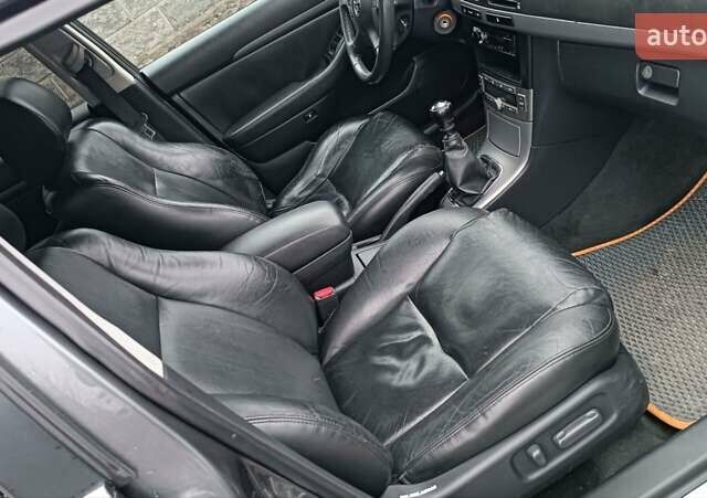 Серый Тойота Авенсис, объемом двигателя 2.2 л и пробегом 285 тыс. км за 5350 $, фото 26 на Automoto.ua