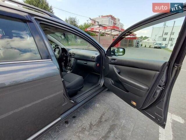 Сірий Тойота Авенсіс, об'ємом двигуна 2 л та пробігом 251 тис. км за 6350 $, фото 9 на Automoto.ua