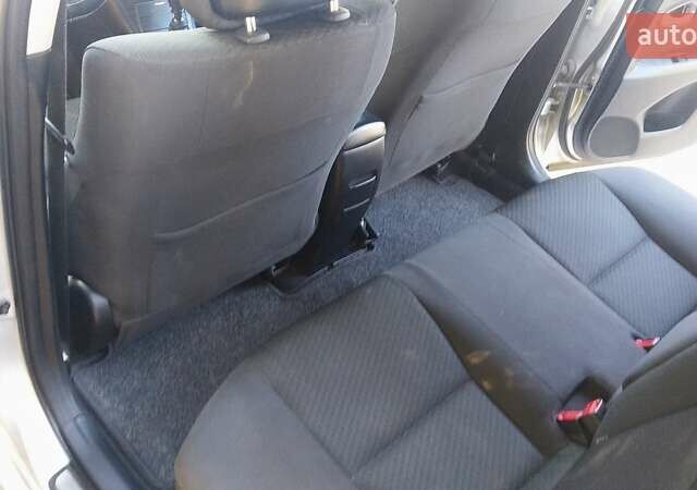 Серый Тойота Авенсис, объемом двигателя 2 л и пробегом 309 тыс. км за 7999 $, фото 6 на Automoto.ua