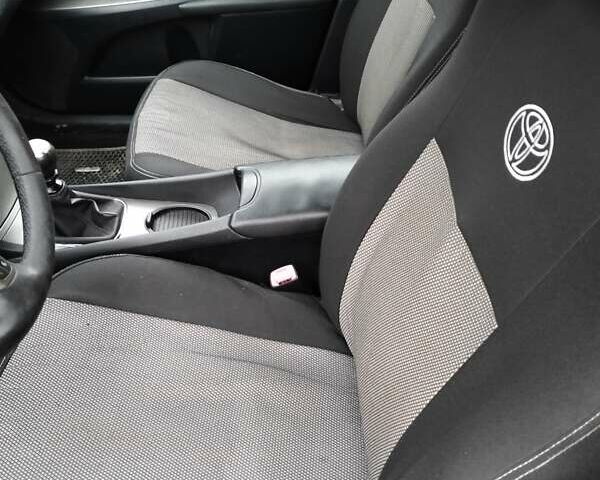 Серый Тойота Авенсис, объемом двигателя 2 л и пробегом 313 тыс. км за 8000 $, фото 5 на Automoto.ua