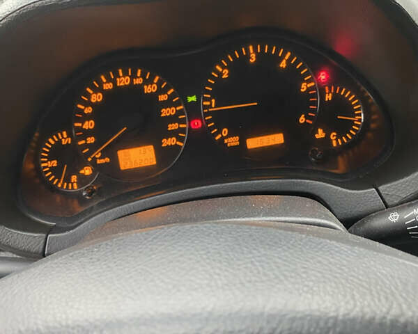 Серый Тойота Авенсис, объемом двигателя 1.99 л и пробегом 236 тыс. км за 5300 $, фото 8 на Automoto.ua