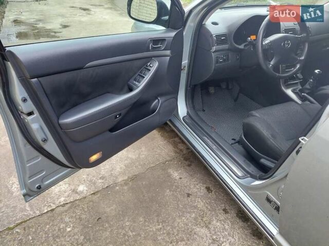 Сірий Тойота Авенсіс, об'ємом двигуна 2 л та пробігом 257 тис. км за 6500 $, фото 10 на Automoto.ua
