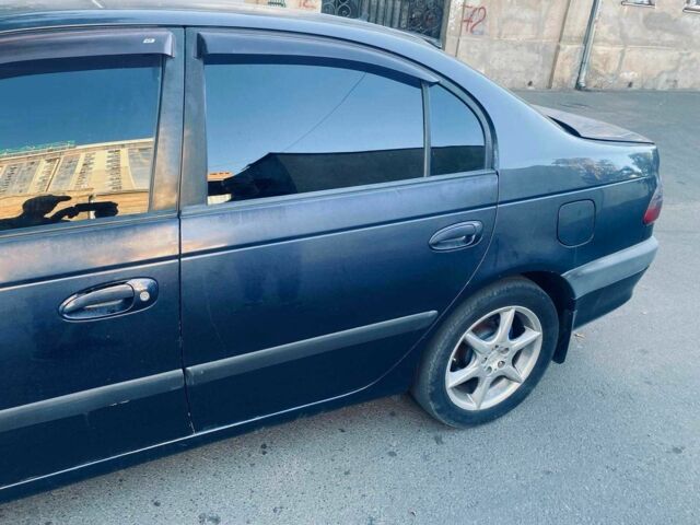 Синий Тойота Авенсис, объемом двигателя 2 л и пробегом 285 тыс. км за 2800 $, фото 2 на Automoto.ua