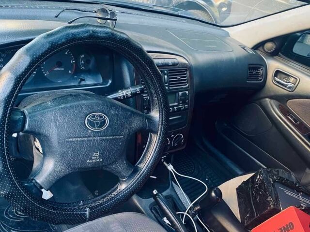 Синий Тойота Авенсис, объемом двигателя 2 л и пробегом 285 тыс. км за 2800 $, фото 1 на Automoto.ua