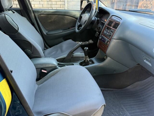 Синий Тойота Авенсис, объемом двигателя 1.8 л и пробегом 250 тыс. км за 2300 $, фото 11 на Automoto.ua