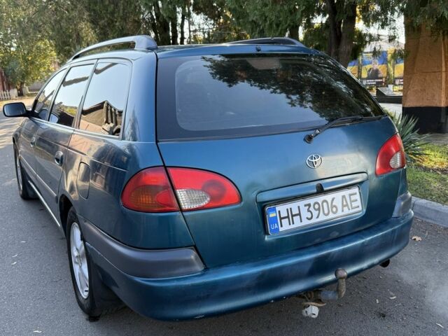 Синий Тойота Авенсис, объемом двигателя 1.8 л и пробегом 250 тыс. км за 2300 $, фото 2 на Automoto.ua