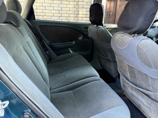 Синий Тойота Авенсис, объемом двигателя 1.8 л и пробегом 250 тыс. км за 2300 $, фото 12 на Automoto.ua