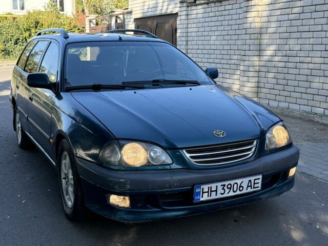 Синий Тойота Авенсис, объемом двигателя 1.8 л и пробегом 250 тыс. км за 2300 $, фото 1 на Automoto.ua