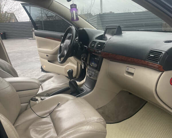 Синій Тойота Авенсіс, об'ємом двигуна 2 л та пробігом 300 тис. км за 6000 $, фото 12 на Automoto.ua