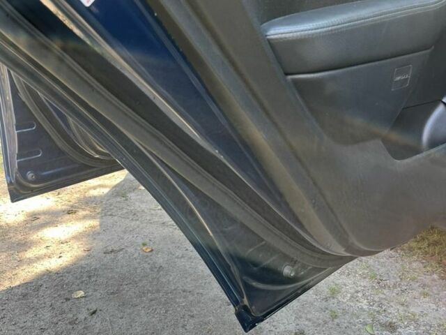 Синий Тойота Авенсис, объемом двигателя 2 л и пробегом 400 тыс. км за 3813 $, фото 4 на Automoto.ua