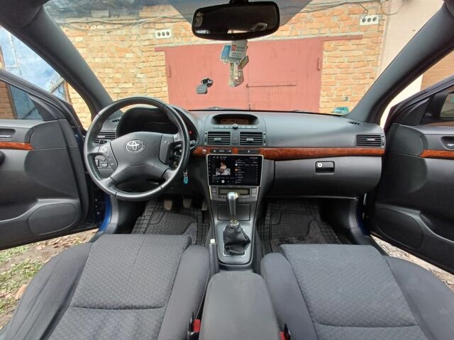 Синій Тойота Авенсіс, об'ємом двигуна 2 л та пробігом 227 тис. км за 7400 $, фото 5 на Automoto.ua