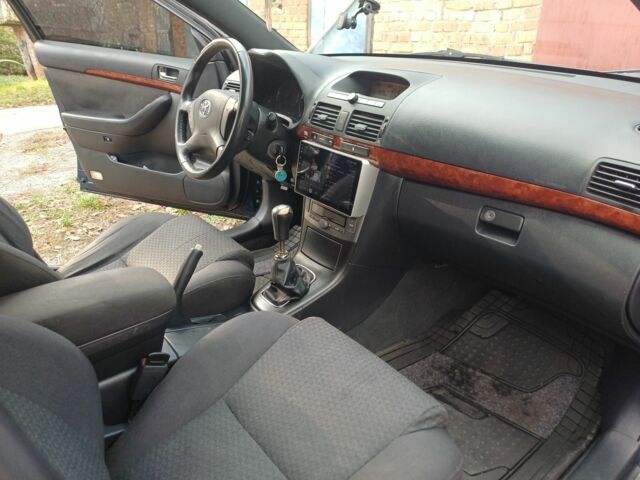 Синій Тойота Авенсіс, об'ємом двигуна 2 л та пробігом 227 тис. км за 7400 $, фото 4 на Automoto.ua