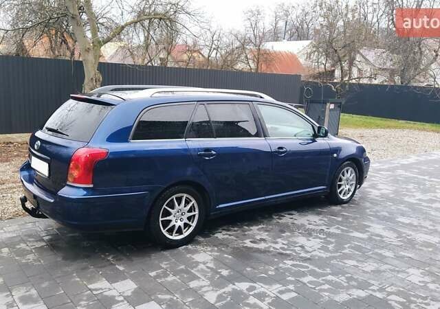 Синій Тойота Авенсіс, об'ємом двигуна 2 л та пробігом 324 тис. км за 5600 $, фото 2 на Automoto.ua
