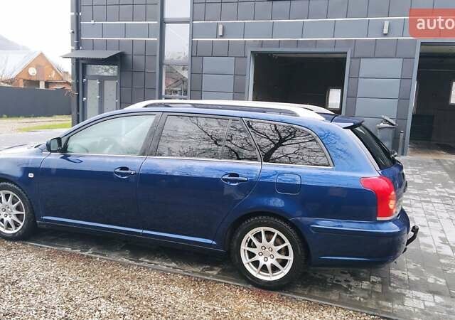 Синій Тойота Авенсіс, об'ємом двигуна 2 л та пробігом 324 тис. км за 5600 $, фото 3 на Automoto.ua
