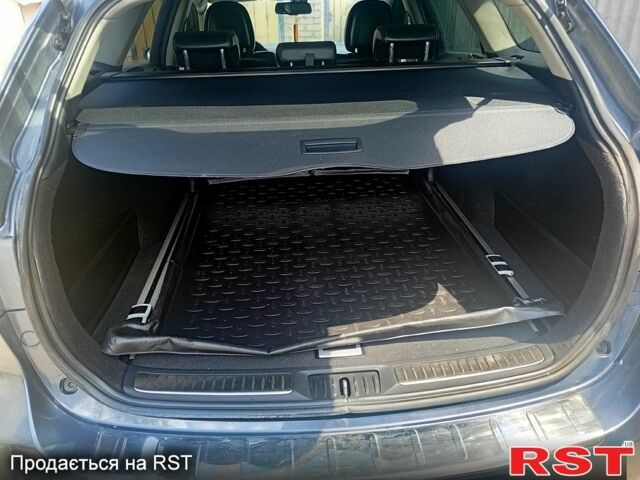 Синій Тойота Авенсіс, об'ємом двигуна 2 л та пробігом 60 тис. км за 9400 $, фото 5 на Automoto.ua