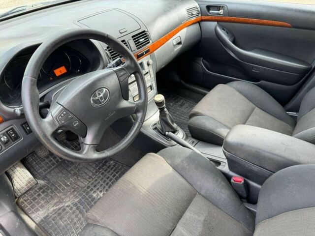 Синий Тойота Авенсис, объемом двигателя 2 л и пробегом 321 тыс. км за 2750 $, фото 4 на Automoto.ua