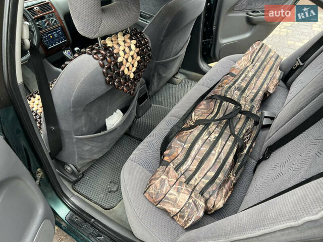 Зеленый Тойота Авенсис, объемом двигателя 1.8 л и пробегом 426 тыс. км за 3800 $, фото 10 на Automoto.ua