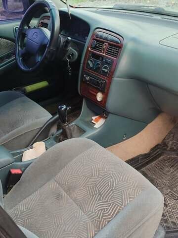 Зеленый Тойота Авенсис, объемом двигателя 1.8 л и пробегом 310 тыс. км за 3200 $, фото 1 на Automoto.ua